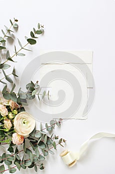 Feminine wedding, birthday desktop mock-ups. Blank craft paper greeting card, envelope. Eucalyptus branches, pink roses