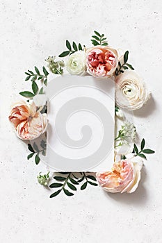 Feminine wedding, birthday mock-up scene. Blank paper greeting card. Floral frame of blush pink English roses