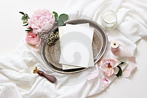 Feminine wedding, birthday mock-up scene. Blank paper greeting cards, candle, pink roses, silk ribbons, peony flowers on
