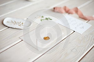 Feminine wedding desktop mock-up with blank paper card and Eucalyptus populus branch on white shabby table background