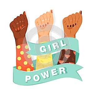 Feminism, girl power concept. Feminism symbol. Woman`s fists showing their power with ribbon and inscription `Girl Power`.