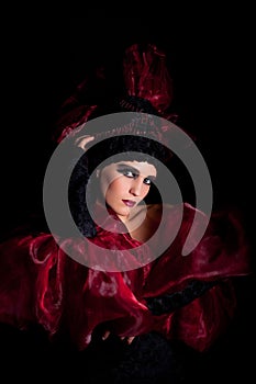Femme fatale in a red-black dress photo