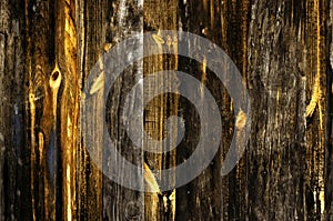 Fence boards or an old fence on a farm