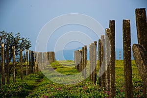 Fence of concrete bars on a plateau