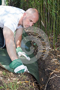 Fence erector at work