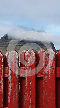 fence in front of the Kirkjufell mountain, Grundafjordur, Iceland