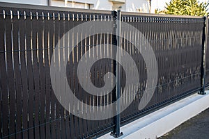 fence grey steel wooden dark modern barrier of suburb house facade