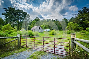 Fence and house in the rural Shenandoah Valley of Virginia.