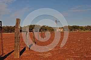 Fence line and windmill in outback australia