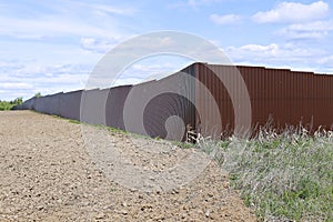 Fence made of brown metal professional flooring