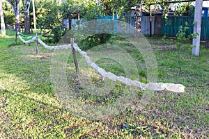 Fence made of old plastic bottles