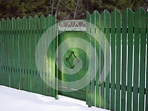 Fence and metal locked gate