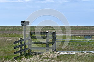 Fence nature reserve,Noard-Fryslan Butendyks, Friesland, Holwerd, The Netherlands. A sign with the Dutch text, Welcome