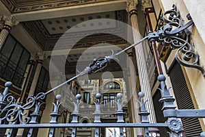 Fence of an old classic decor building in Rome, Italy