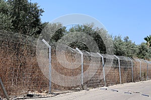 Fence in a park on the shores of the Mediterranean