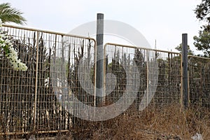 Fence in a park on the shores of the Mediterranean