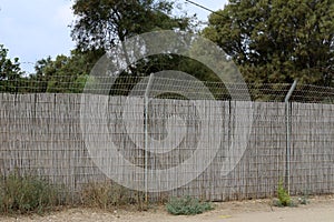 Fence in a park on the shores of the Mediterranean