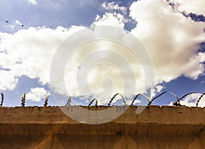 Fence and sky. Freedomn and detention facilities