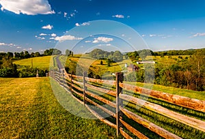 Fence and view of rolling hills and farmland in Antietam National Battlefield