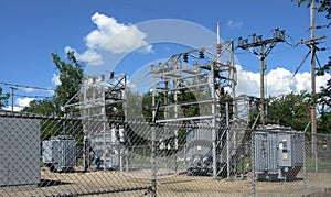 Fenced electrical power substation