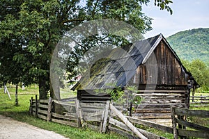 Fenced log house