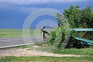 A fenced private area near the roadway