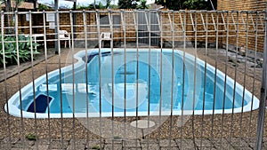 Fenced swimming pool