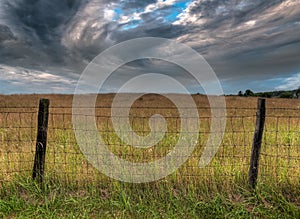 Fenceline and Dramatic Clouds