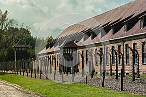 Fences and barracks at The Nazi concentration camp of Auschwitz in Oswiecim, Poland, a UNESCO World Heritage