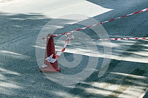 Fencing red and white tape, which prohibits movement. photo