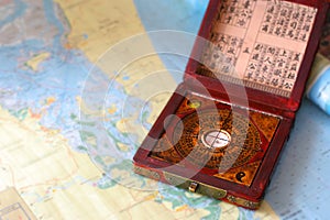 Feng shui compass on a nautical chart