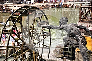 Fenghuang ancient town china and Tuo jiang river statue