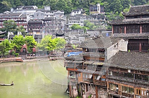 Fenghuang ancient town china and Tuo jiang river tourist boats