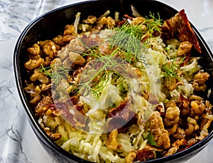 Fennel and apple slaw with crispy pancetta and spicy walnuts. Calgary Alberta Canada