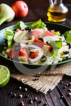 Fennel salad with grapefruit, apple, stalk celery and olives