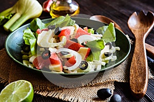 Fennel salad with grapefruit, apple, stalk celery and olives