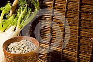 Fennel seeds in a wooden bowl