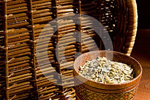 Fennel seeds in a wooden bowl