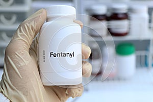 Fentanyl pill in white bottle, pill stock