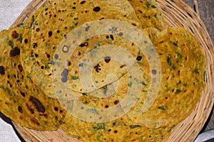 Fenugreek parathas which are kept in a basket made of wood, india`s famous food item