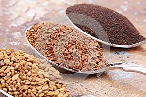 Fenugreek seeds with instant coffee with tea on spoons