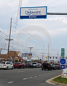 Fenwick Island, Delaware - July 8, 2023 -The view of the road with the 'Welcome to Delaware beaches' sign