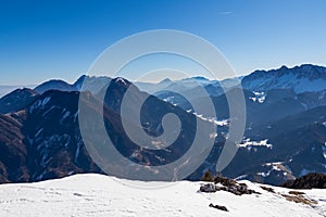 Ferlacher Horn - Scenic view on snow capped mountain peaks of Karawanks, Julian and Kamnik Savinja Alps