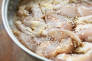 Ferment Fresh chicken with  sauce and sesame for cooking