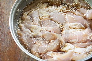 Ferment Fresh chicken with  sauce and sesame for cooking photo