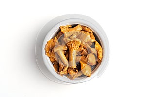 Fermented food. Canned mushrooms in a bowl on a white background