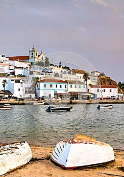 Ferragudo village with fishing boats in Algarve, Portugal