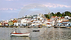 Ferragudo village with fishing boats in Algarve, Portugal