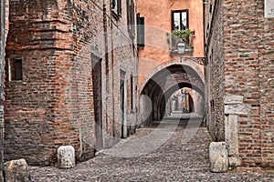 Ferrara, Italy, the medieval alley Via delle Volte photo