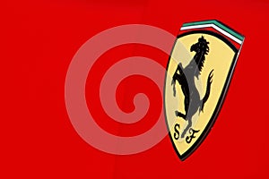 Ferrari logo on red sport car